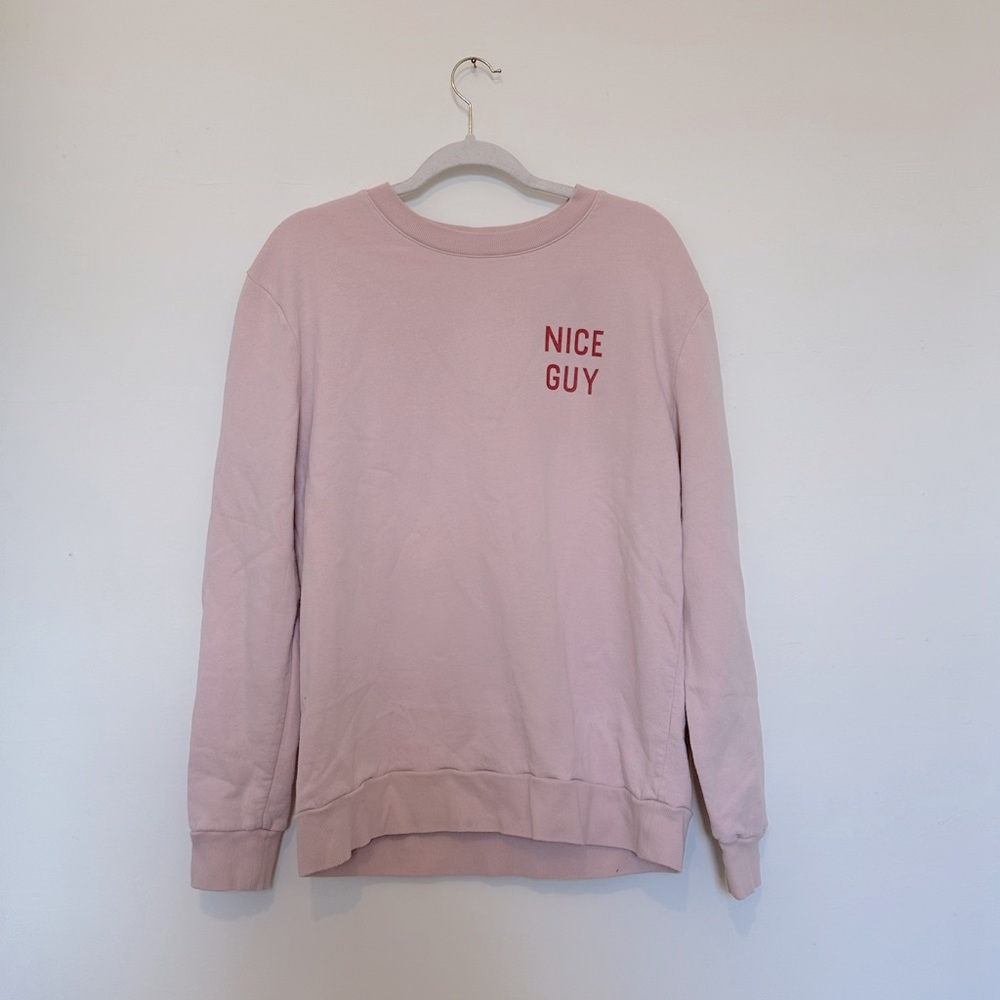 Pink “nice guy” sweater. Size: L